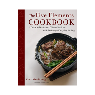 The Five Elements Cookbook by Zoey Xinyi Gong, cover with soba noodle and beef soup in a black pot with chopsticks